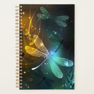 Agenda Vuelo de libélula luminosa verde