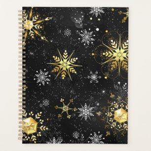 Agenda Xmas copos de nieve dorados sobre fondo negro