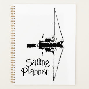 Agenda Yate de vela con su reflejo en un mar en calma