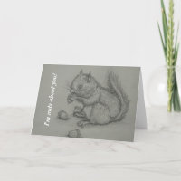 Ardilla que come la tarjeta de felicitación Nuts