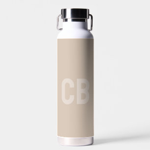 Agua Color de tendencia Taupe suave Monograma Botella d