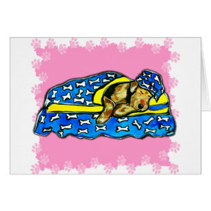 Airedale rosado durmiente