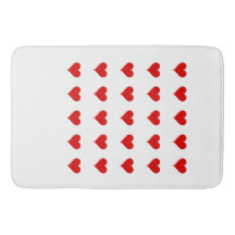 Alfombra de baño con corazones.