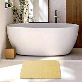 Alfombra de baño con estampado de corazones amaril