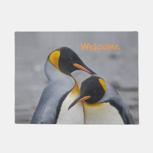 Alfombra de bienvenida de dúo de pingüinos rey