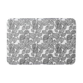 Alfombrilla De Baño Hojas negras en una tina blanca de baño