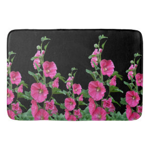 Alfombrilla De Baño Hollyhocks rosados sobre negro