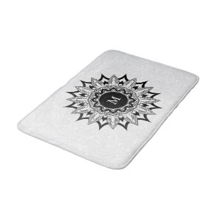 Alfombrilla De Baño Mandala negra en un paisaje blanco