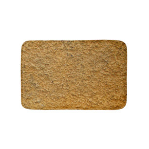 Alfombrilla De Baño Pared amarilla cruda áspera de la construcción d