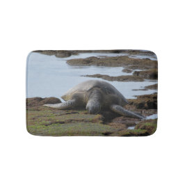 Alfombrilla De Baño Tortuga que descansa sobre las rocas
