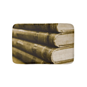 Alfombrilla De Baño Una pila de libros antiguos