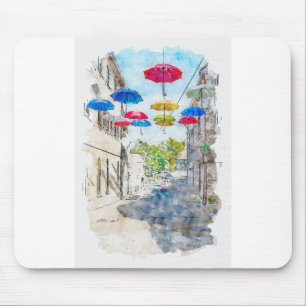Alfombrilla De Ratón Aquarelle sketch art. Street with multicolored umb