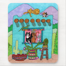 Cinco gatos en una casa de Aqua Adobe