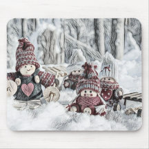 Gnomes en una almohadilla de ratón de invierno