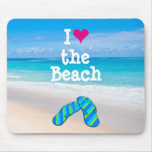 I corazón (amor) los flips-flopes de la playa en