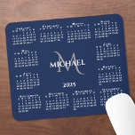 Alfombrilla De Ratón Monograma de Moda del calendario 2025 sobre azul m<br><div class="desc">La almohadilla del ratón del calendario de moda 2025 presenta un nombre y un monograma personalizados y elegantes sobre el año en el medio, rodeados por un calendario blanco sobre un fondo azul marino. Añade tu nombre e inicial en la barra lateral. ¡Hace un gran regalo! Copyright ©Claire E. Skinner....</div>