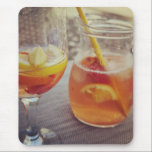 Alfombrilla De Ratón Sangria and Sunshine<br><div class="desc">This image shows a refreshing glass and pitcher of citrus sangria, perfect for a warm day. The fresh slices of lemon and orange add bright colour and hint of natural sweetness. One glass sits ready to enjoy while sangria is being poured from a small glass pitcher beside it, perfect for...</div>