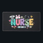 Alfrombrillas De Escritorio Cute Easter Nurse Medical Humor<br><div class="desc">Colorful lettering with a nurse hat,  stethoscope,  flowers and playful medical symbols. A cheerful graphic celebrating caring nurses and healthcare professionals during the Easter season with a bright and friendly hospital atmosphere.</div>