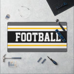Alfrombrillas De Escritorio FOOTBALL Sporty Gris Black Yellow Carreras Stripes<br><div class="desc">Este diseño deportivo colorido y audaz presenta texto atlético de FOOTBALL dentro de una banda negra central ancha adosada con rayas de carreras doradas amarillas,  blancas y grises. Los colores y el texto de este diseño se pueden personalizar.</div>