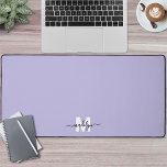 Alfrombrillas De Escritorio Monograma de nombre de guión púrpura<br><div class="desc">Nombre Inicial Personalizado Monograma Purple Desk Mat. Añada un toque personal y elegante a su espacio de trabajo con esta alfombra de escritorio personalizado, perfecta como accesorio de oficina o almohadilla de ratón sobredimensionada. El diseño presenta un fondo morado suave con un nombre de guión inicial blanco y negro colocado...</div>