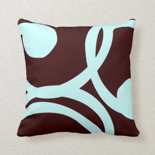 almohada abstracta verde azulada y marrón del