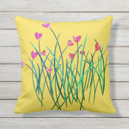 Almohada al aire libre amarilla con las flores del