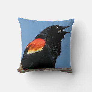 Almohada al aire libre con animales de ave negra d