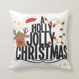 Almohada alegre del navidad del acebo del reno