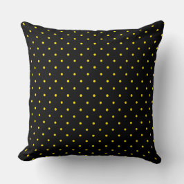 Almohada amarilla con lunares sobre negra