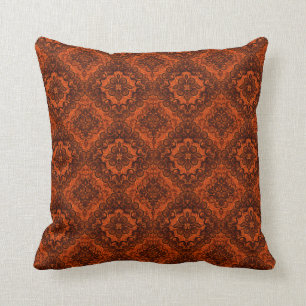 Almohada anaranjada quemada del remolino del