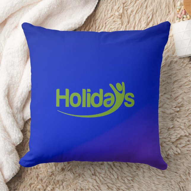 Almohada azul con texto verde "Vacaciones" (Manta)
