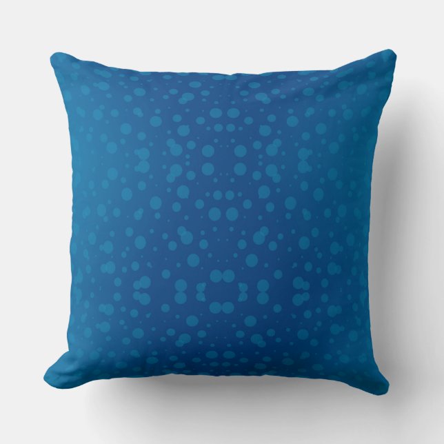 Almohada azul con un patrón de círculos turquesa (Anverso)
