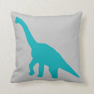 Almohada azul del dinosaurio gris clara