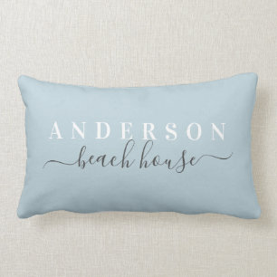 Almohada azul lumbar de la Casa Familiar con apell