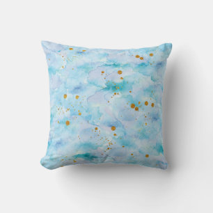 almohada azul morada acuarela con manchas doradas