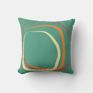 Almohada azul turquesa profunda con rosa polvorien