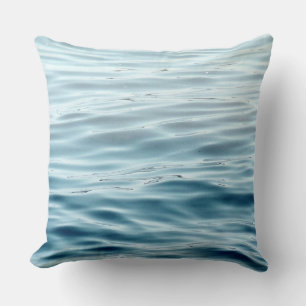 Almohada azul y gris agua