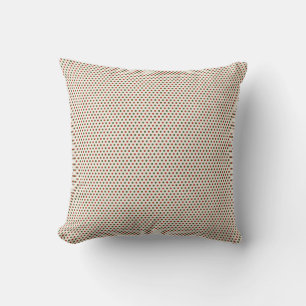 Almohada beige con un pequeño estampado geométrico