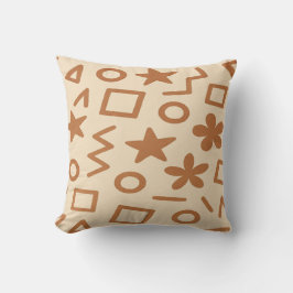 Almohada beige y marrón rojizo
