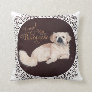 Almohada blanca del perro de Pekingese