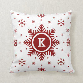 Almohada blanca y roja del copo de nieve del día