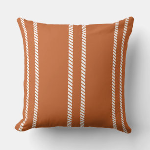 Almohada clásica de naranja quemada con rayas