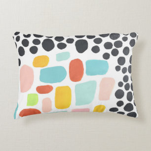 Almohada colorida. Punto brillante amarillo, rosa