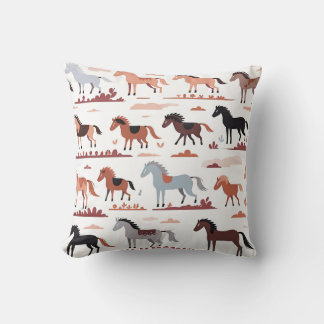 Almohada con caballos abstractos.