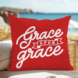 Almohada con cita cristiana en rojo brillante