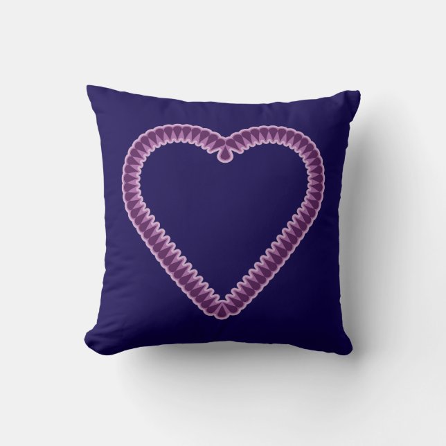 almohada con corazón sobre fondo oscuro (Anverso)