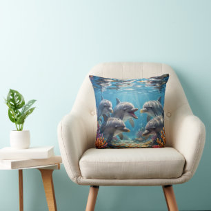 Almohada con delfines.