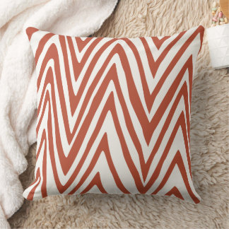 Almohada con diseño de cebra en naranja quemado y 