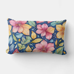 Almohada con fondo azul con hojas y flor