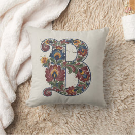 Almohada con inicial B de Rosemaling noruego